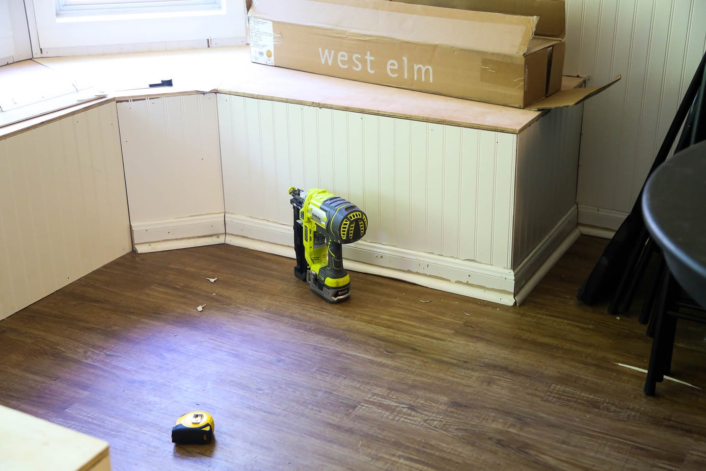 Bay window bench partially completed with baseboards in-progress