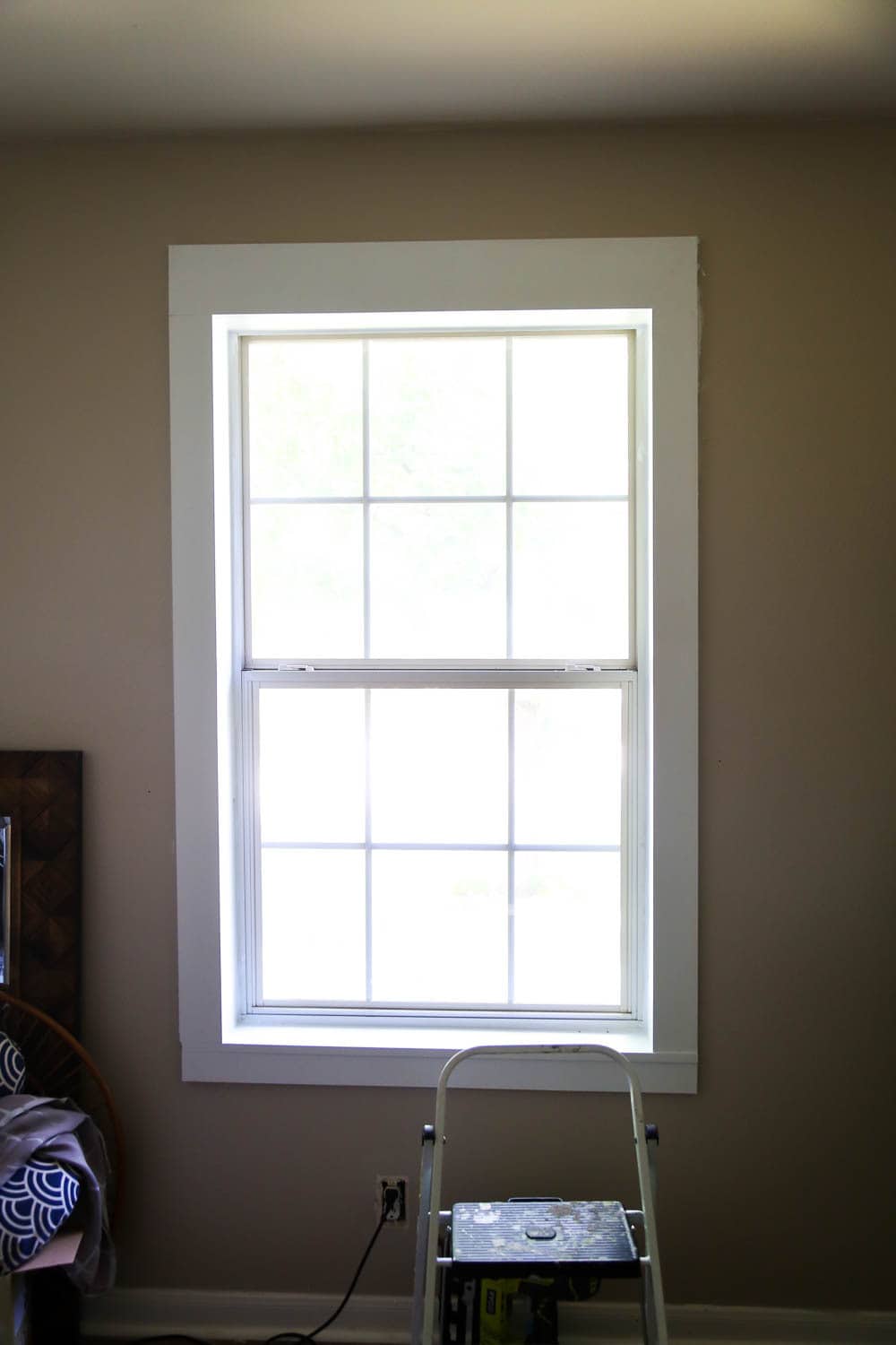 a window with very simple trim installed around it 