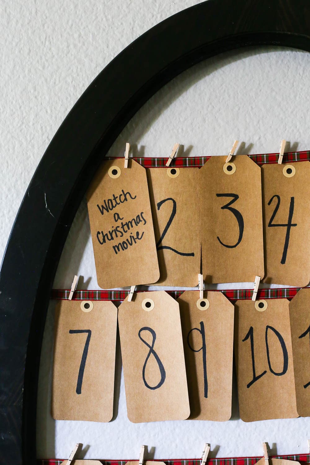 Close up of a frame with advent cards on it 