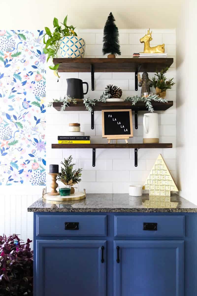 kitchen open shelving decorated for Christmas