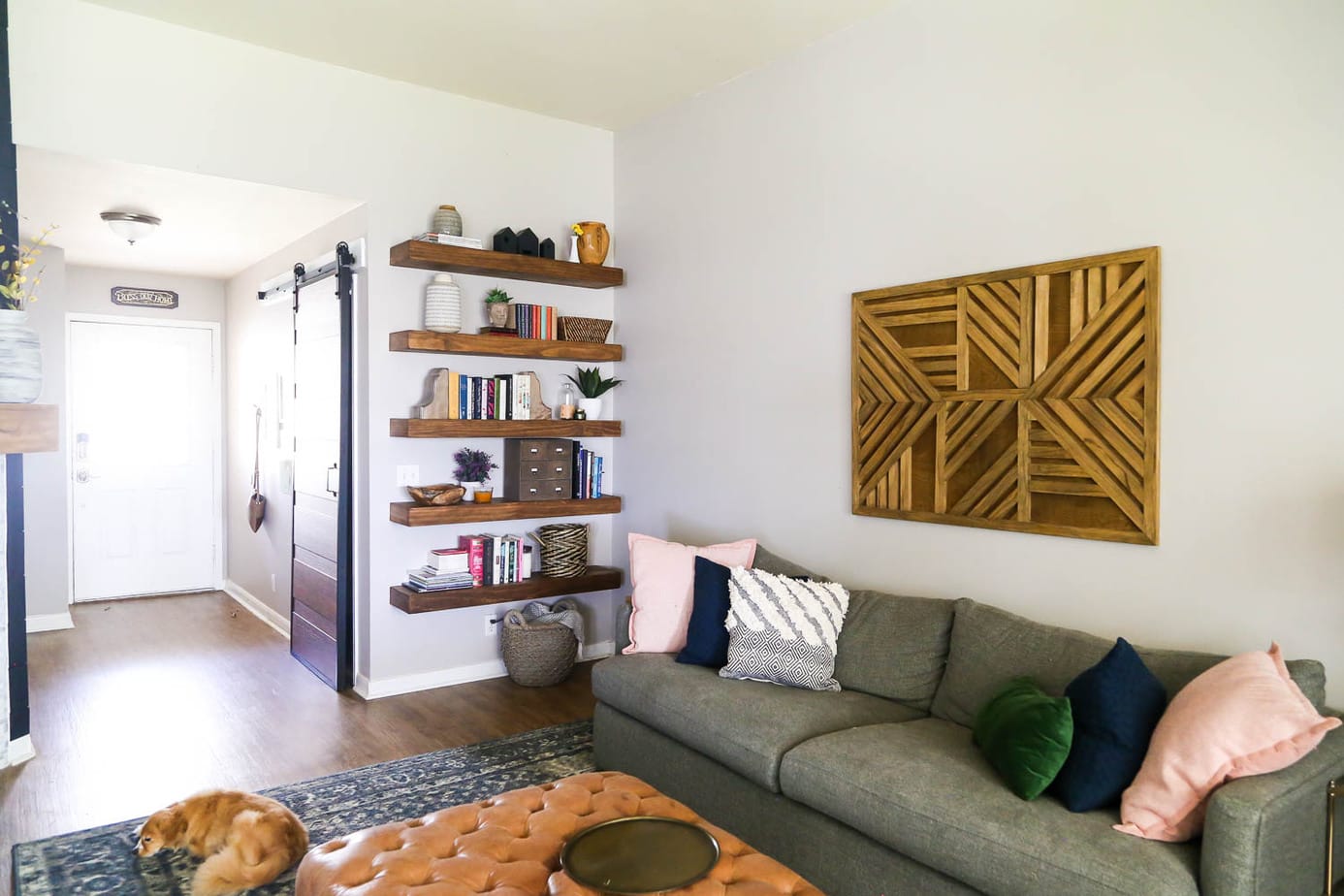 living room with floating shelves