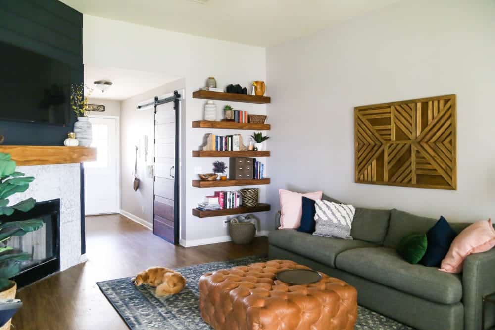 Living room with tufted leather ottoman