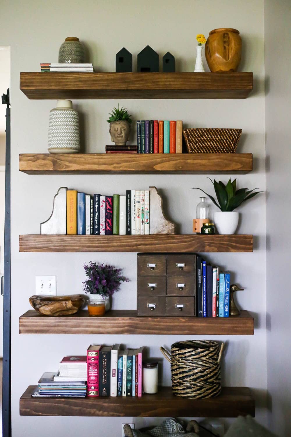 wall with floating shelves
