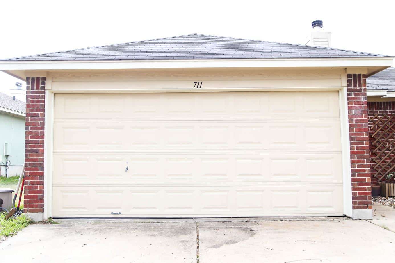 Garage door makeover before