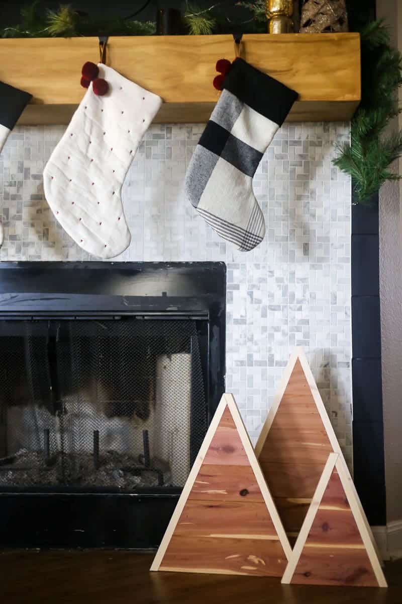 Fireplace with three cedar planked trees in front