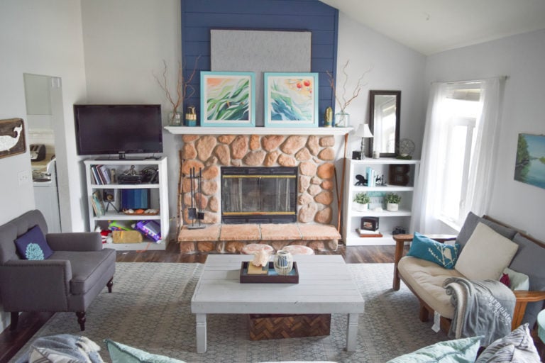Fireplace with stone and blue shiplap