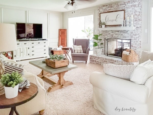 fireplace with whitewashed brick