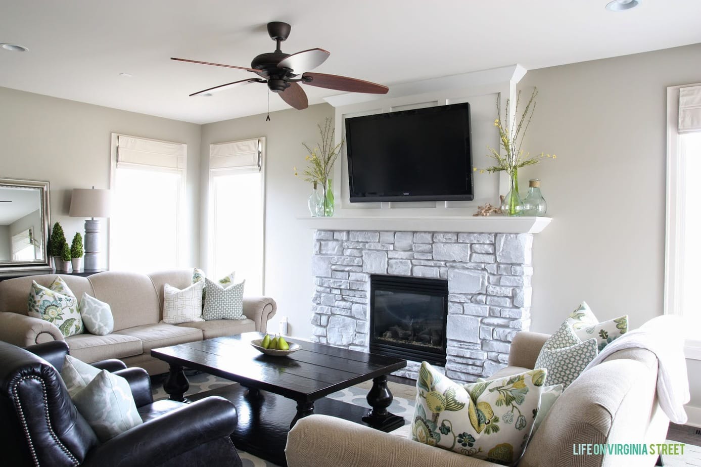 white washed stone fireplace