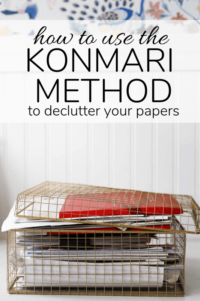 box of paper with text overlay - "how to use the konmari method to declutter your papers"