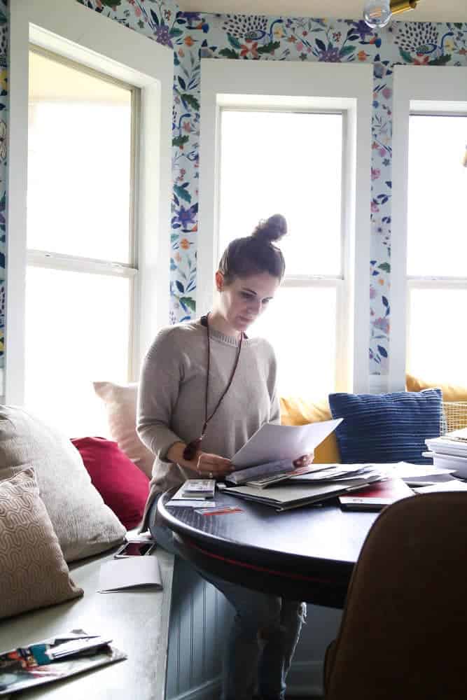 woman sorting papers using the Konmari method