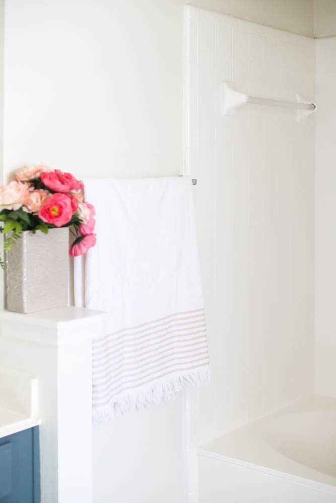 corner of a bathroom with a painted bathtub 