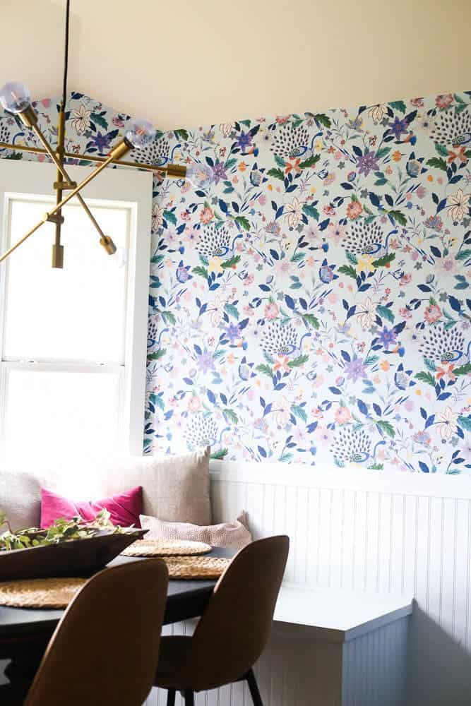 small dining room with floral wallpaper