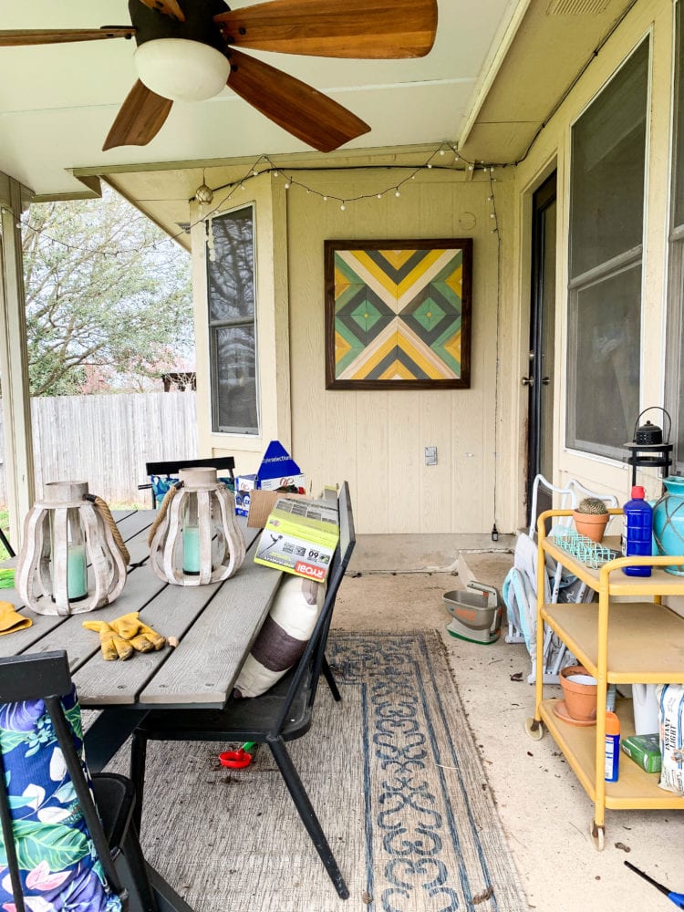 back patio before mini refresh - with clutter and trash