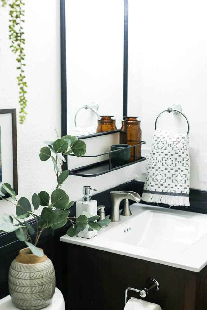 a black and white hallway bathroom
