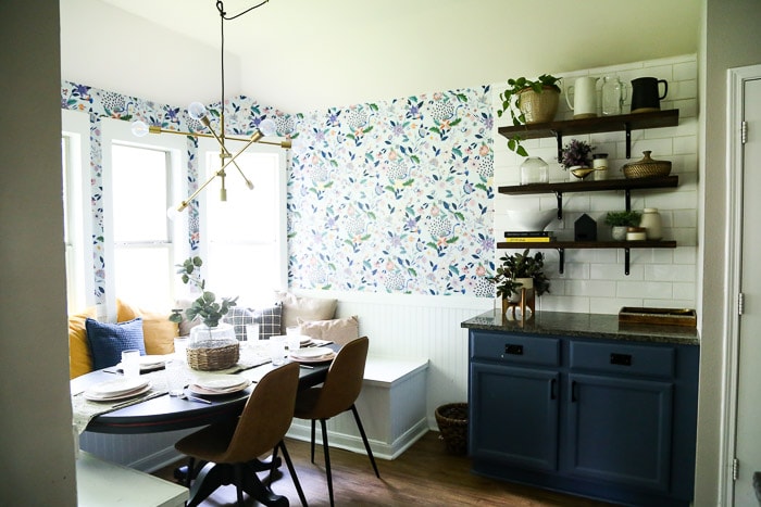 dining room with bench seating and open shelving