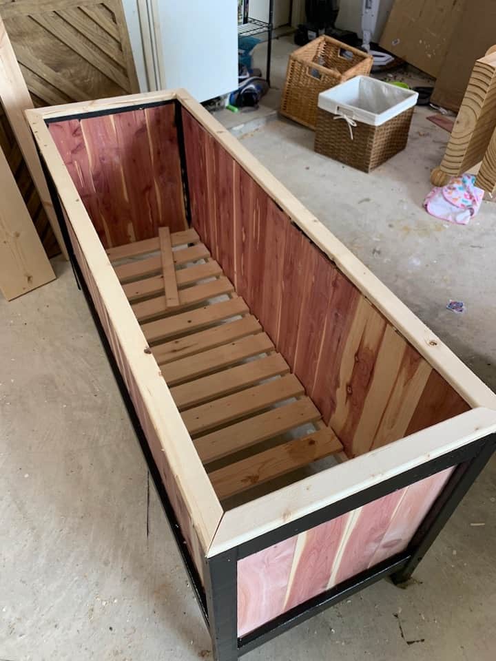 cedar planter with trim being added to top