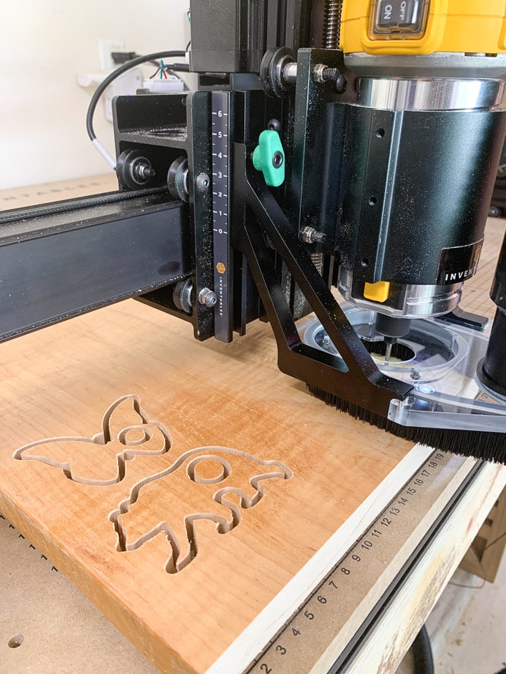 Close-up of X-Carve machine cutting out animal shapes for teethers
