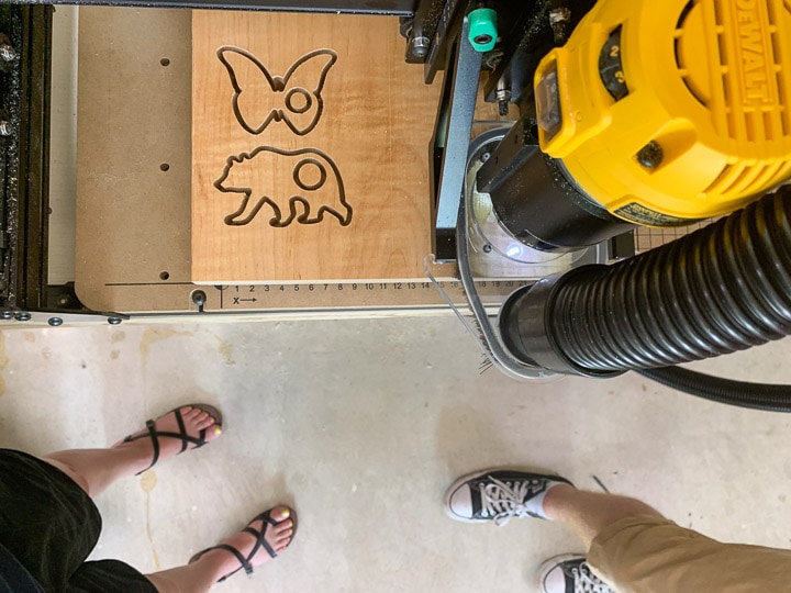 X-Carve machine cutting out animal shapes