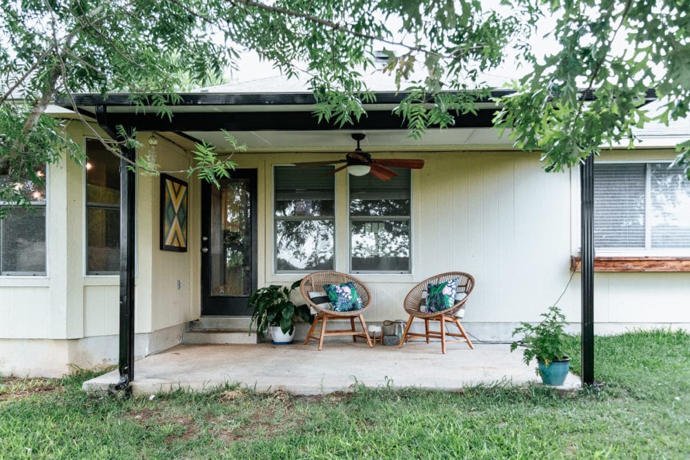 Back patio with black awning