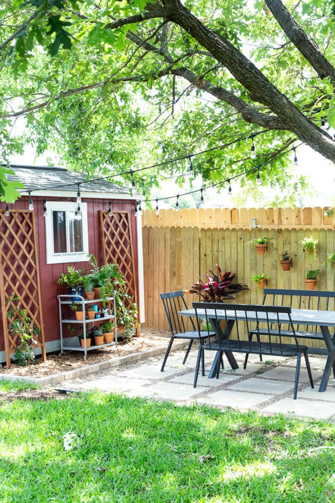 pea gravel and paver patio styled for dining