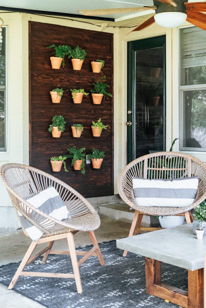 back porch with a living wall full of plants