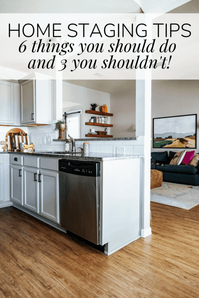 kitchen with gray cabinet and view into a colorful living room