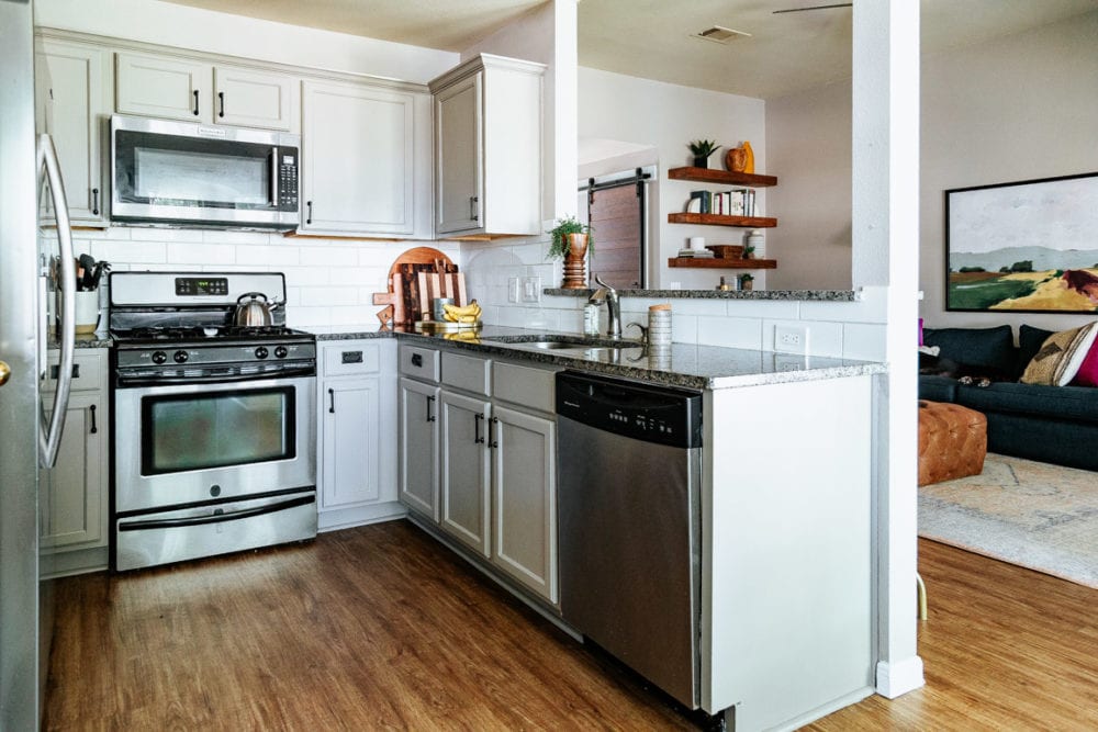 small kitchen with greige cabinets