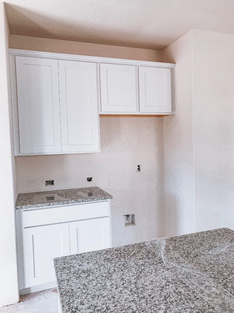an unfinished kitchen in a new construction home 