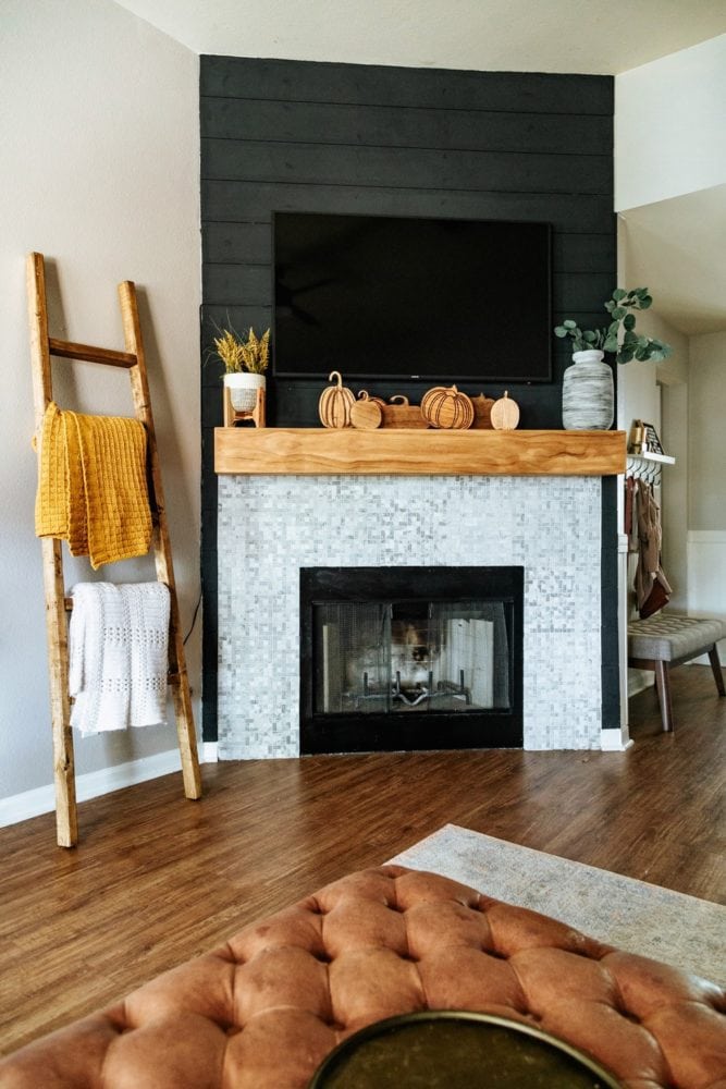 living room with glue down vinyl plank flooring 