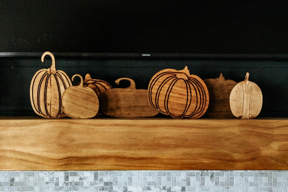 collection of wooden carved pumpkins