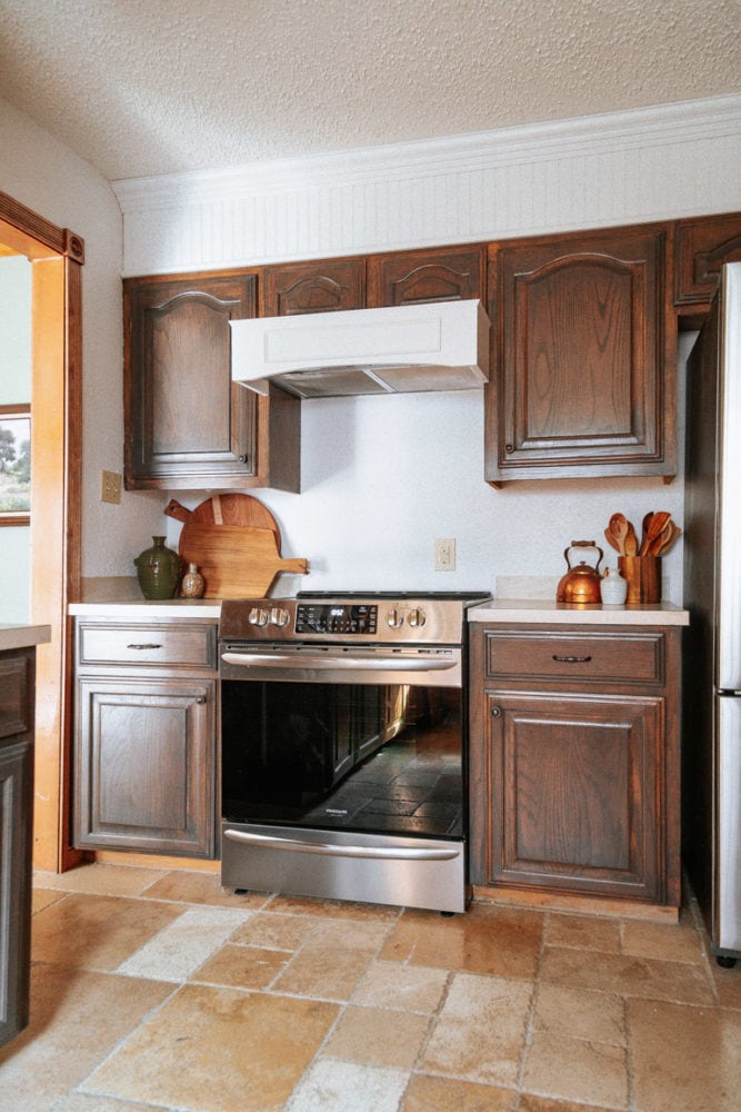 kitchen after refresh with new cabinet stain and new oven