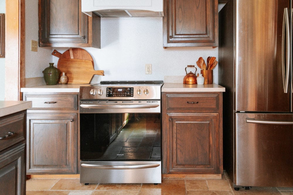 kitchen with dark brown cabinetry and a Frigidaire gallery range