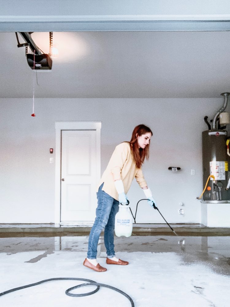 woman cleaning a garage floor