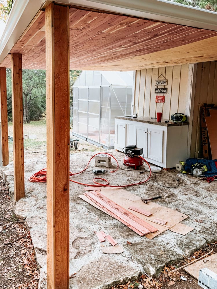in-progress patio with cedar plank ceiling. 