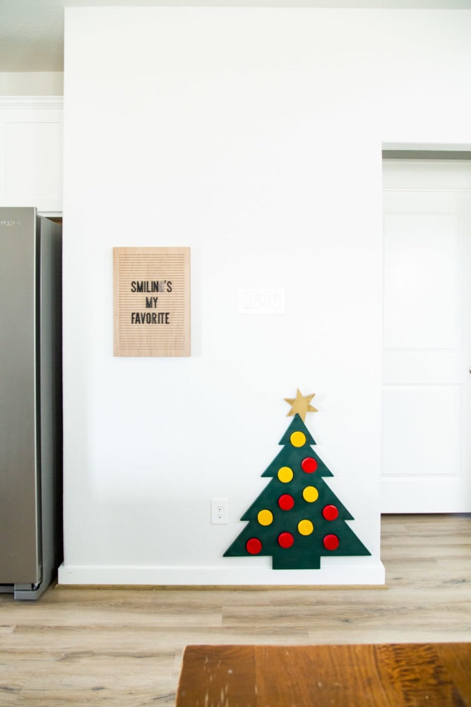 kitchen with a toy wooden Christmas tree