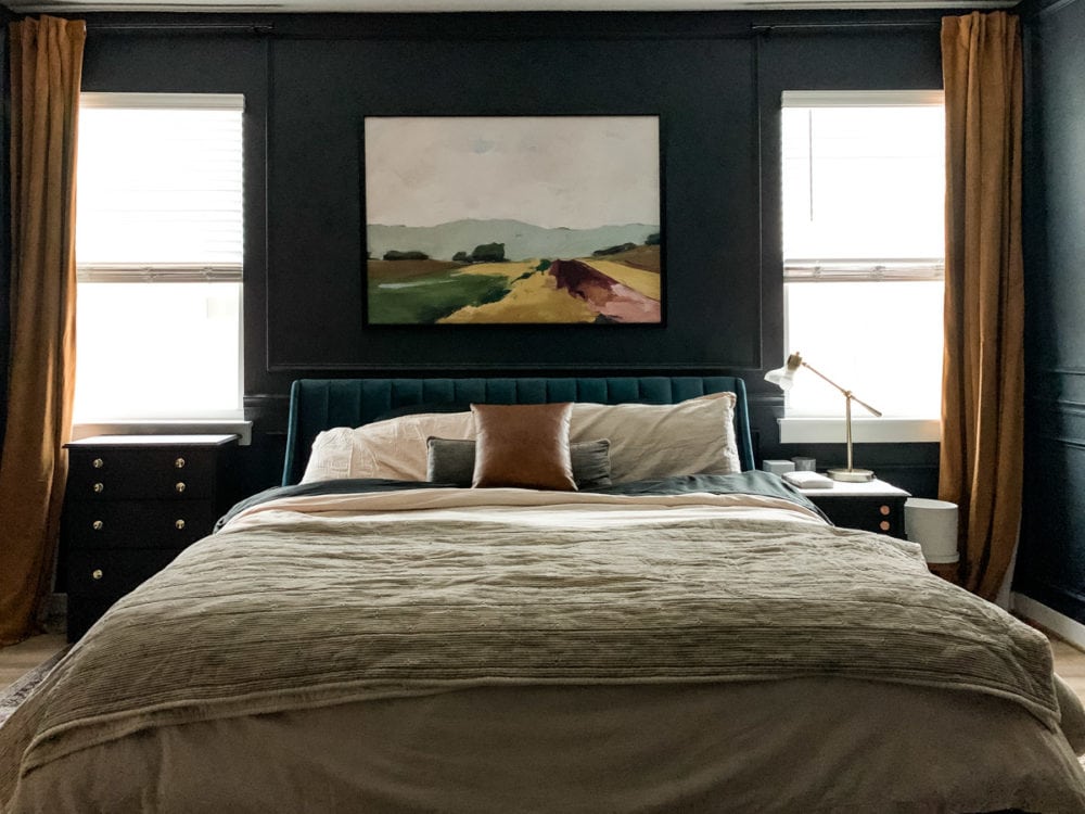 dark bedroom with gold curtains