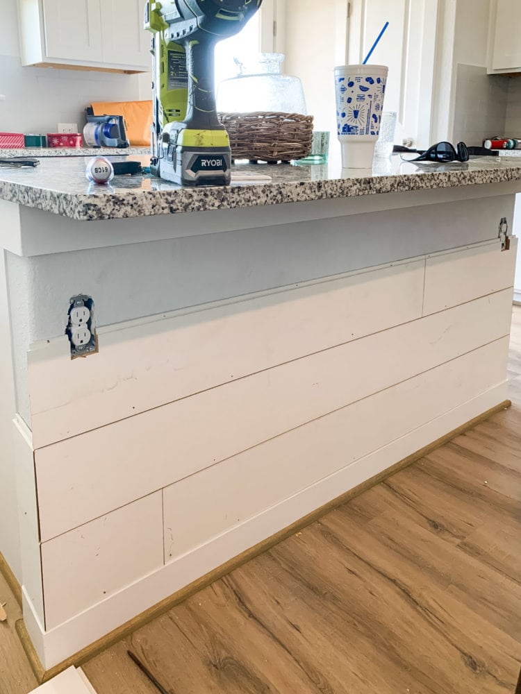 partially-installed shiplap on kitchen island