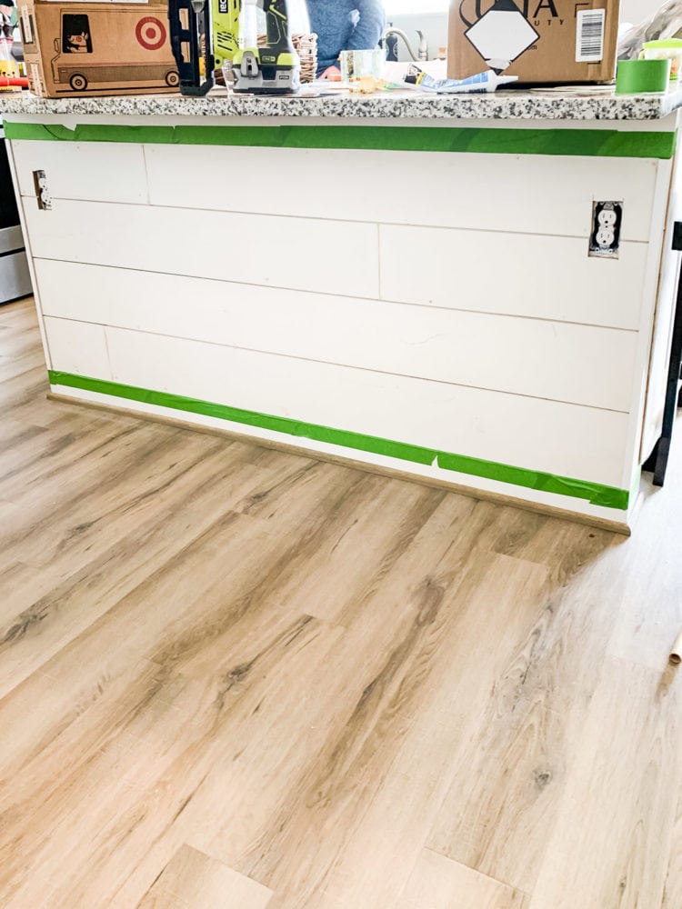 kitchen island with shiplap installed ready for paint