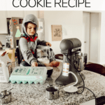 young boy baking on a large kitchen island