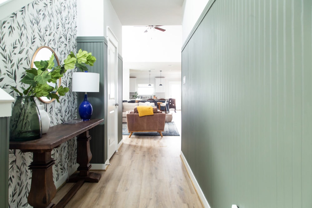 entryway with green paneling