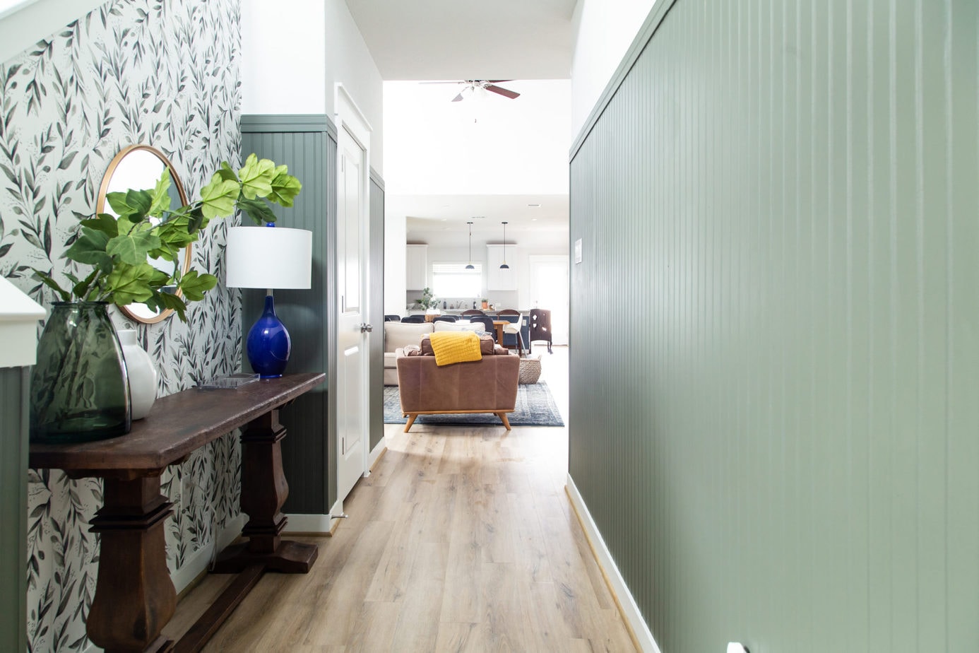 entryway with green paneling