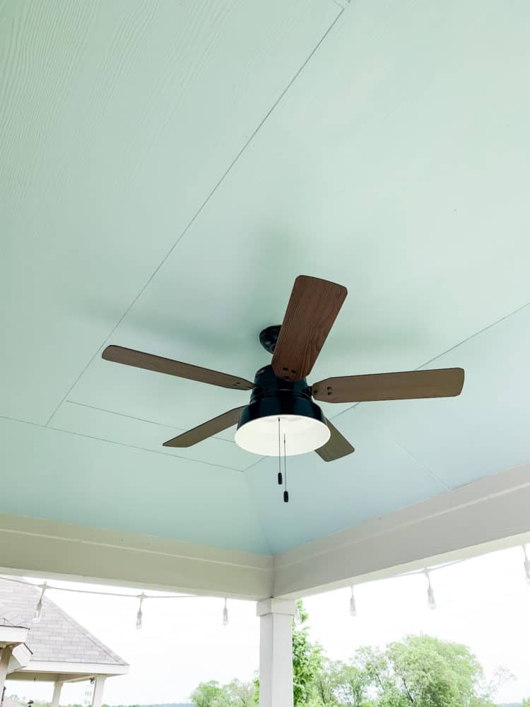 Close up of back porch ceiling painted Rain by Sherwin Williams