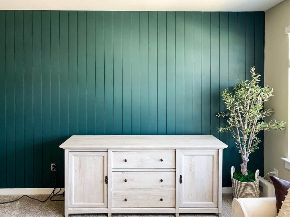 green shiplap wall