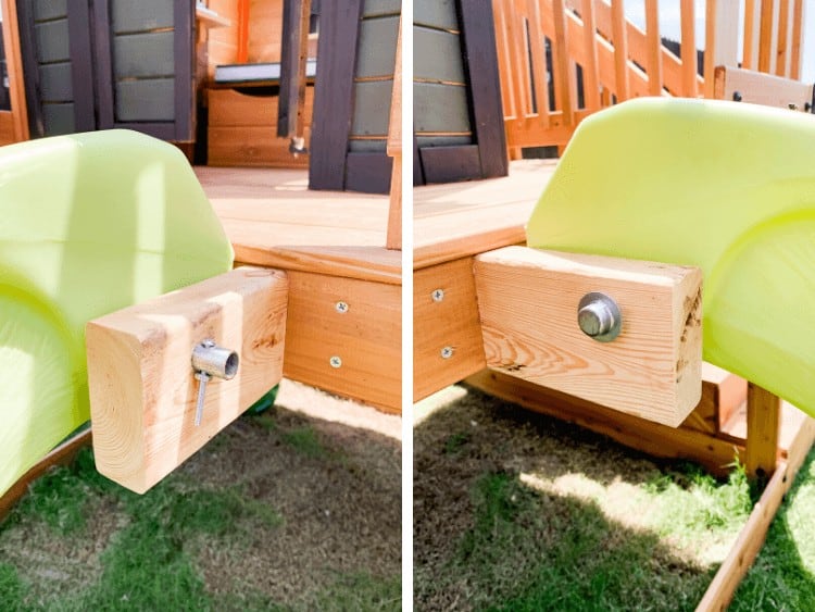 close up of attaching a slide to a playhouse