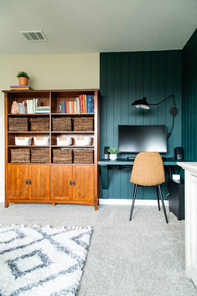 large bookcase and floating desk