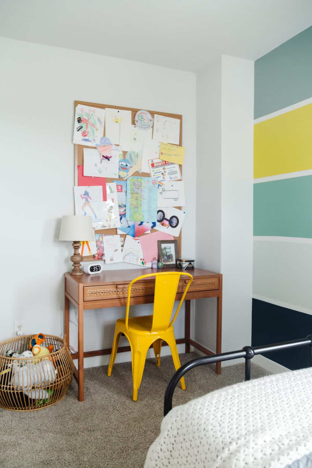 kid room with desk and large bulletin board