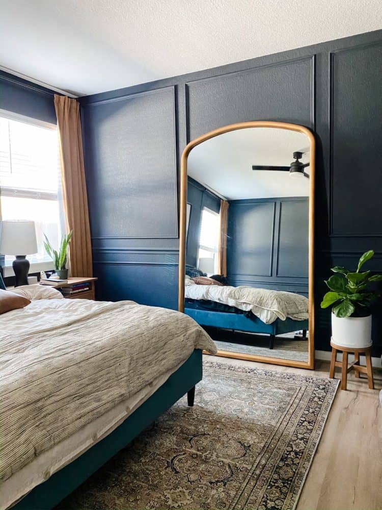 bedroom with a small fiddle leaf fig