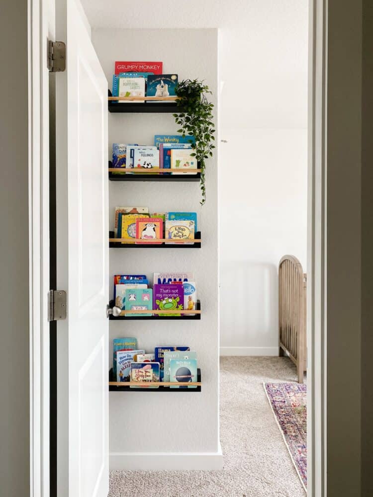 view of DIY book ledges from hallway