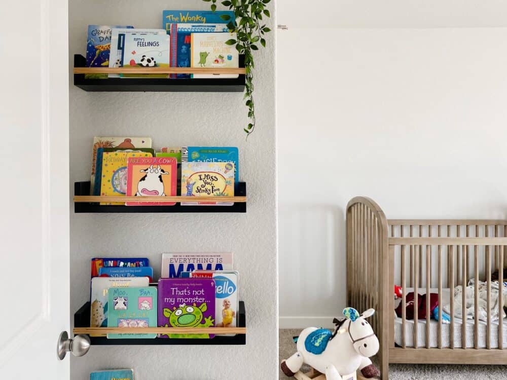 nursery with black book ledges 