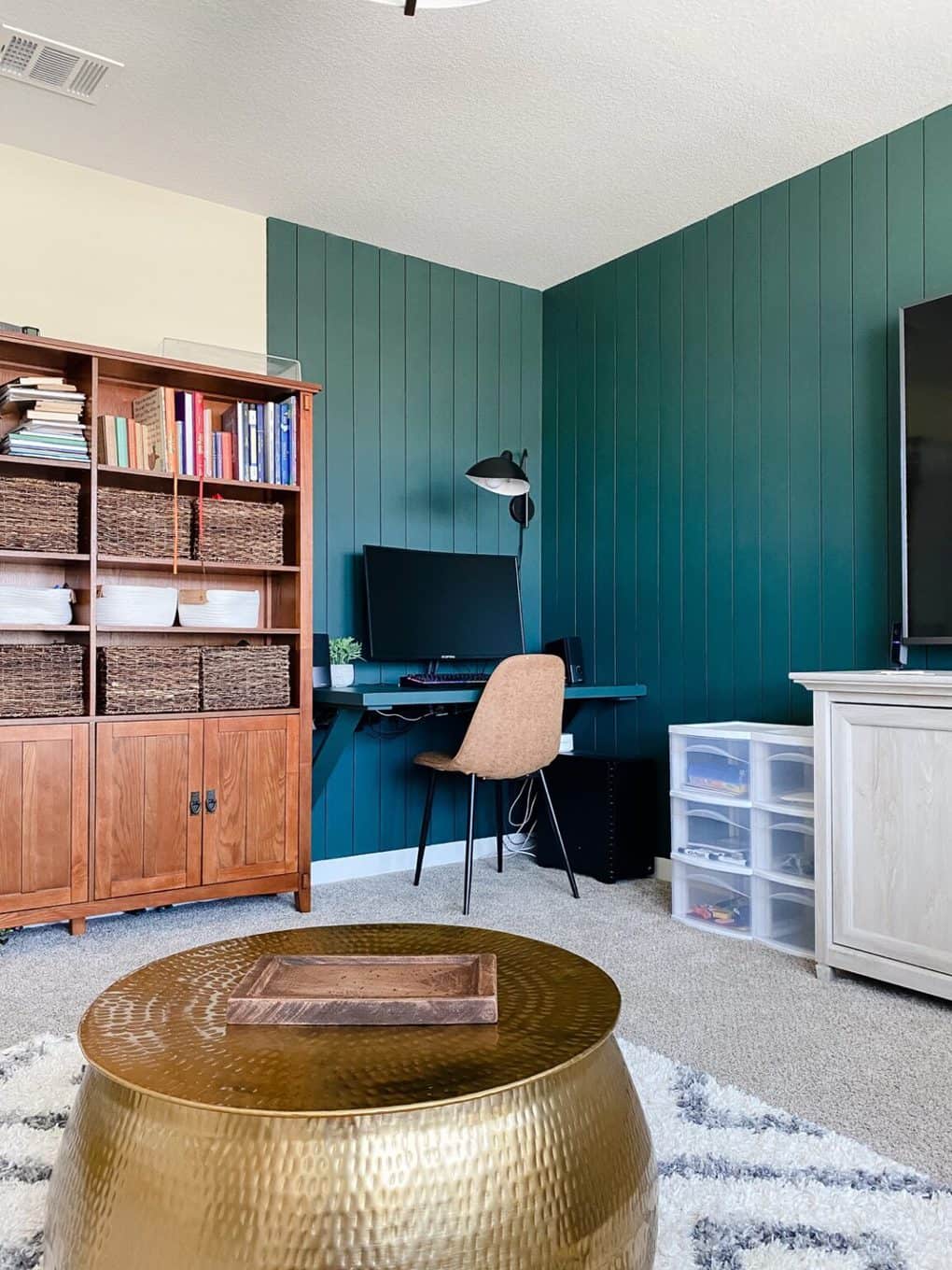a corner floating desk in a family room
